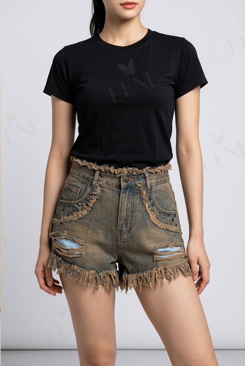 Quần short jean cạp cao rách tua rua đính đinh tán